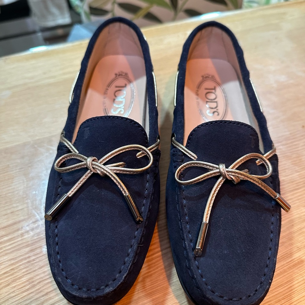 Tod's Dark Blue Suede Loafers with Gold Accents